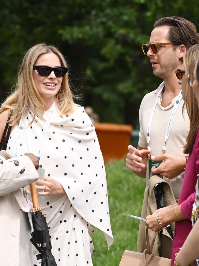 Robbie joined a star-studded crowd at the All England Lawn Tennis and Croquet Club. Picture: Getty