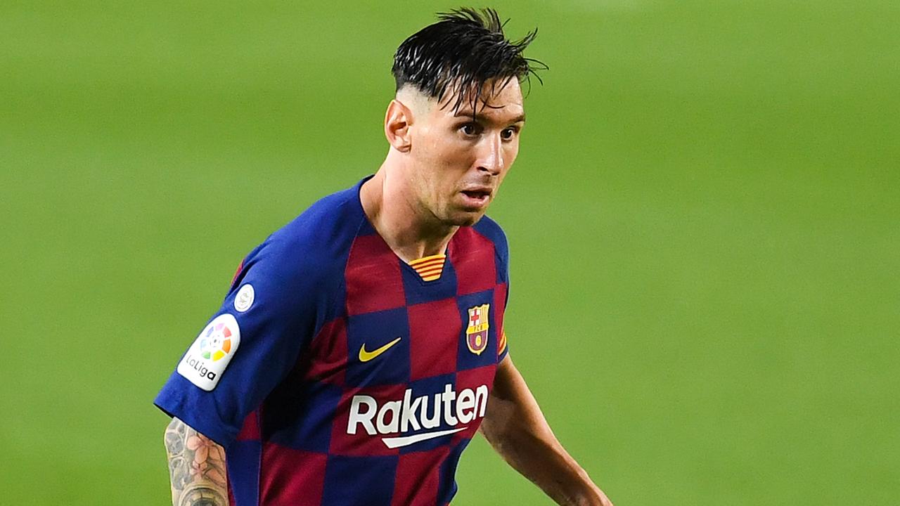 Lionel Messi scored his 700th career goal while sporting a questionable haircut. (Photo by David Ramos/Getty Images)