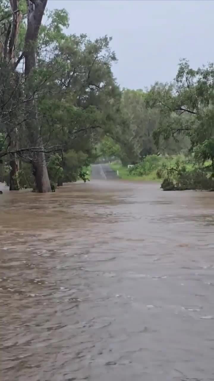 Bridge disappears in flood waters near Kingaroy