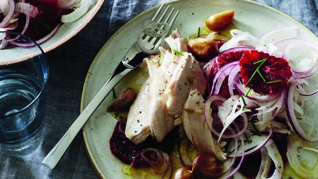 Chicken with lots of garlic alongside blood orange and fennel salad. Picture: Guy Baile