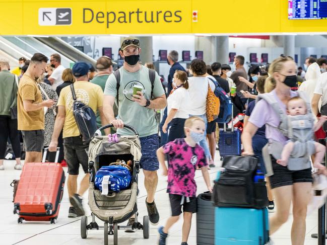 Big crowds at Brisbane Airport on Friday. Picture: Richard Walker