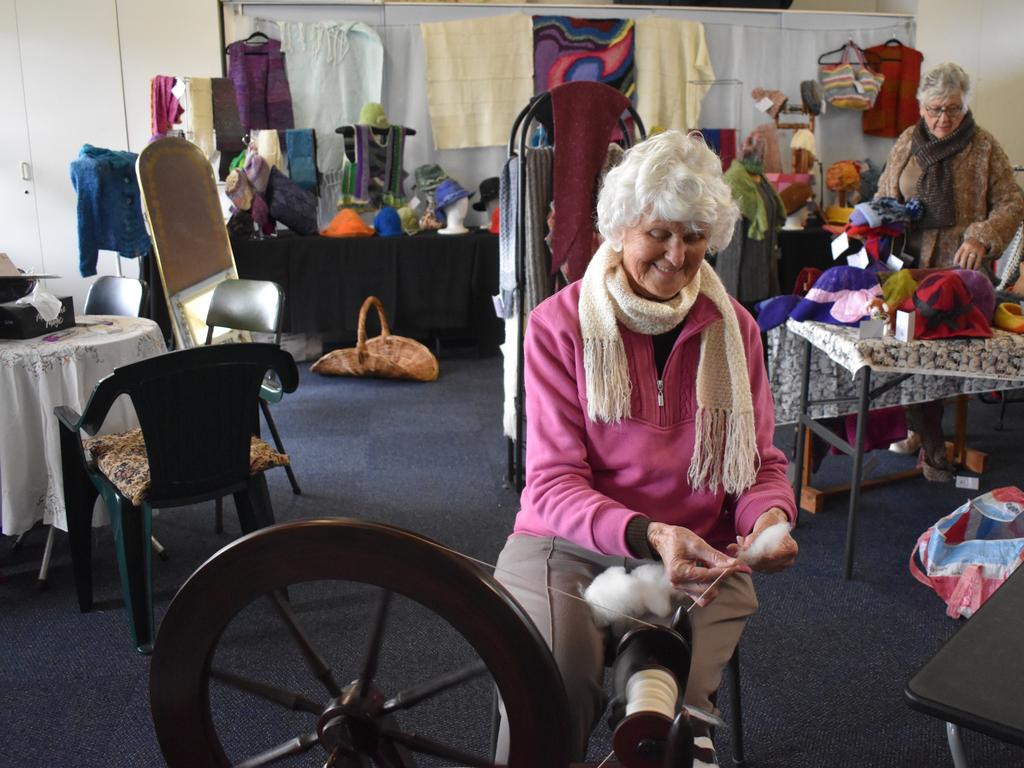 Volunteer Dawn Booth at her yarn spinning wheel. July 17, 2024. (Photo: NRM)