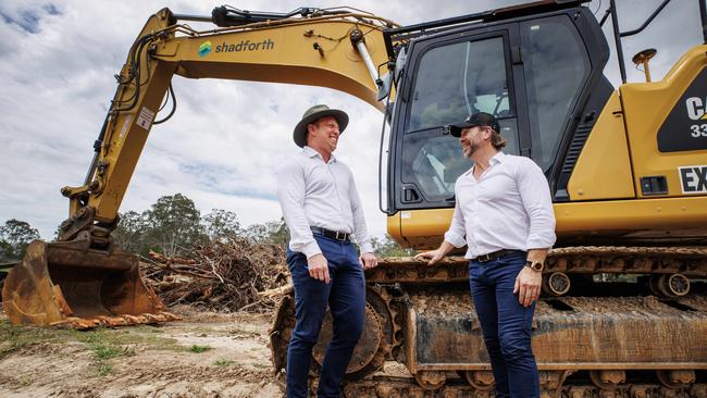 Deputy Premier Steven Miles and Kent Leicester, Managing Director of KDL Property group at a housing development site at Joyner on Sunday morning. Picture Lachie Millard