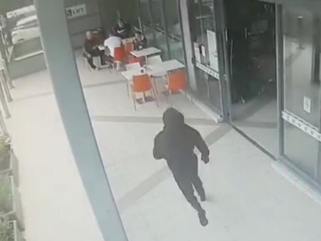 CCTV footage of killer approaching Walid Ahmad at Bankstown Central on April 29 2016.