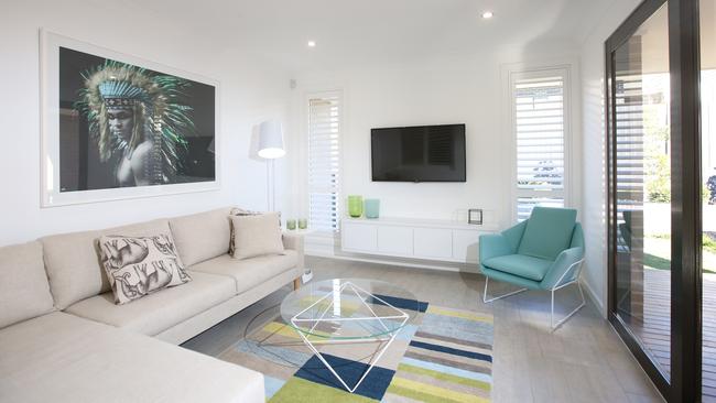 A rumpus room off the open-plan area offers plenty of living area alternatives for families.