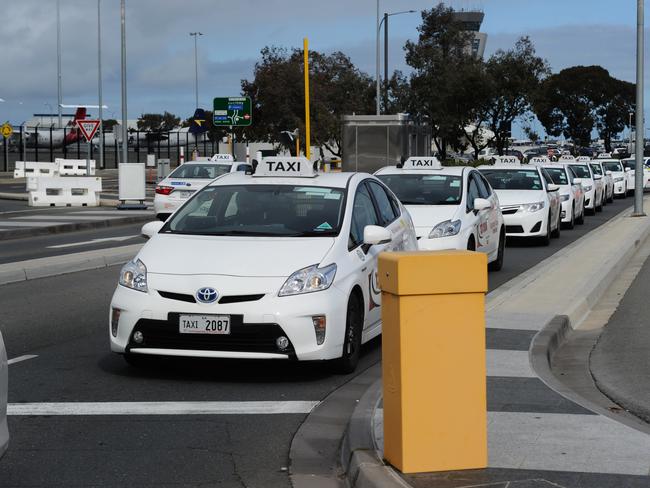 Taxi line up in the rank at the Adelaide Airport. Picture: MICHAEL MARSCHALL