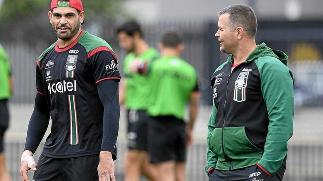 South Sydney Rabbitohs player Greg Inglis (left) speaks with coach Anthony Seibold during a team training session at Redfern Oval. Picture: DAN HIMBRECHTS