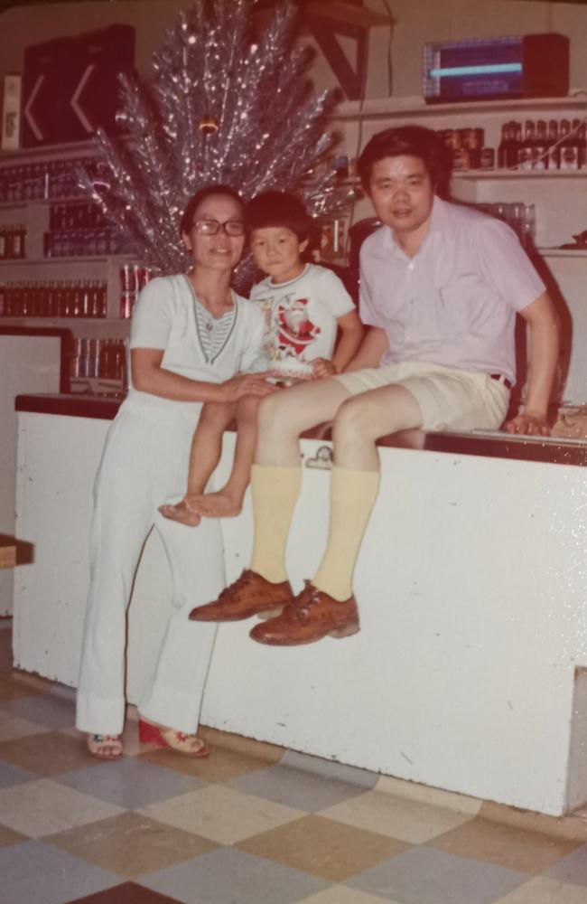 Chris Ho with parents John and Juliana Ho at their Walgett restaurant, the Hong Doo Cafe in NSW, 1975.