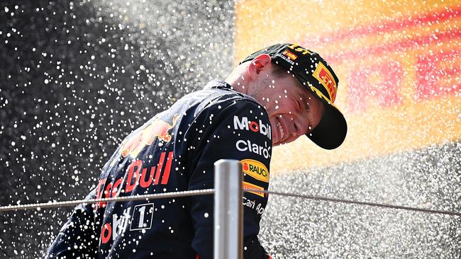 Max Verstappen celebrates a race win.