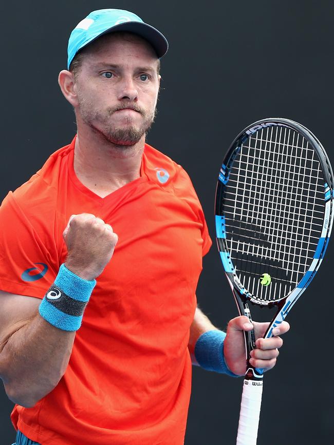 James Duckworth celebrates winning a point in his match.