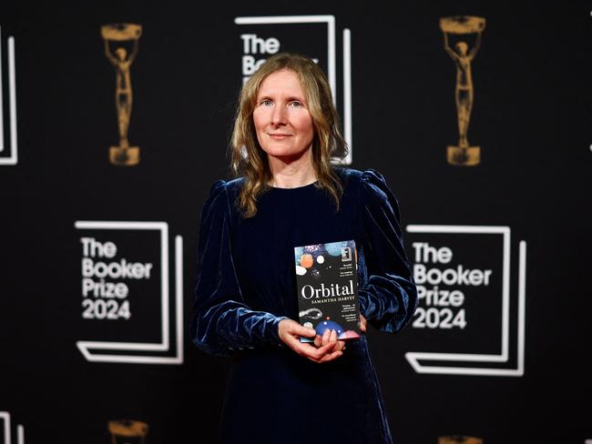 British writer Samantha Harvey and Booker Prize 2024 shortlisted author for her book "Orbital" poses on the red carpet upon arrival for the Booker Prize Award announcement ceremony, at the Old Billingsgate, in London, on November 12, 2024. Six authors, including five female authors, a record number, are vying to win the prestigious English-language literary award, of the Â£50,000 ($64,500) prize to be announced at a glitzy ceremony in London. (Photo by HENRY NICHOLLS / AFP)