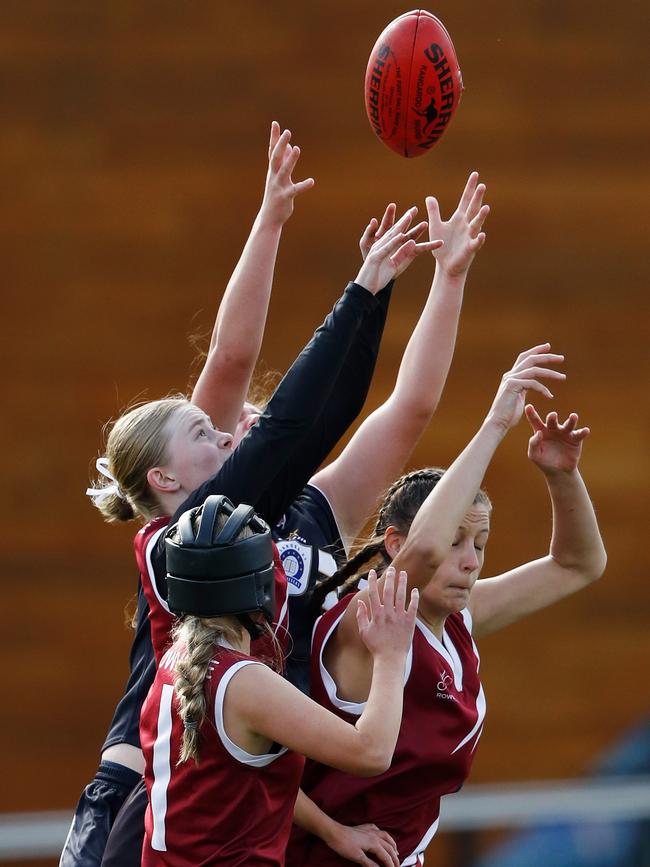 Players compete for the ball. Picture: Dylan Burns/AFL Photos via Getty Images