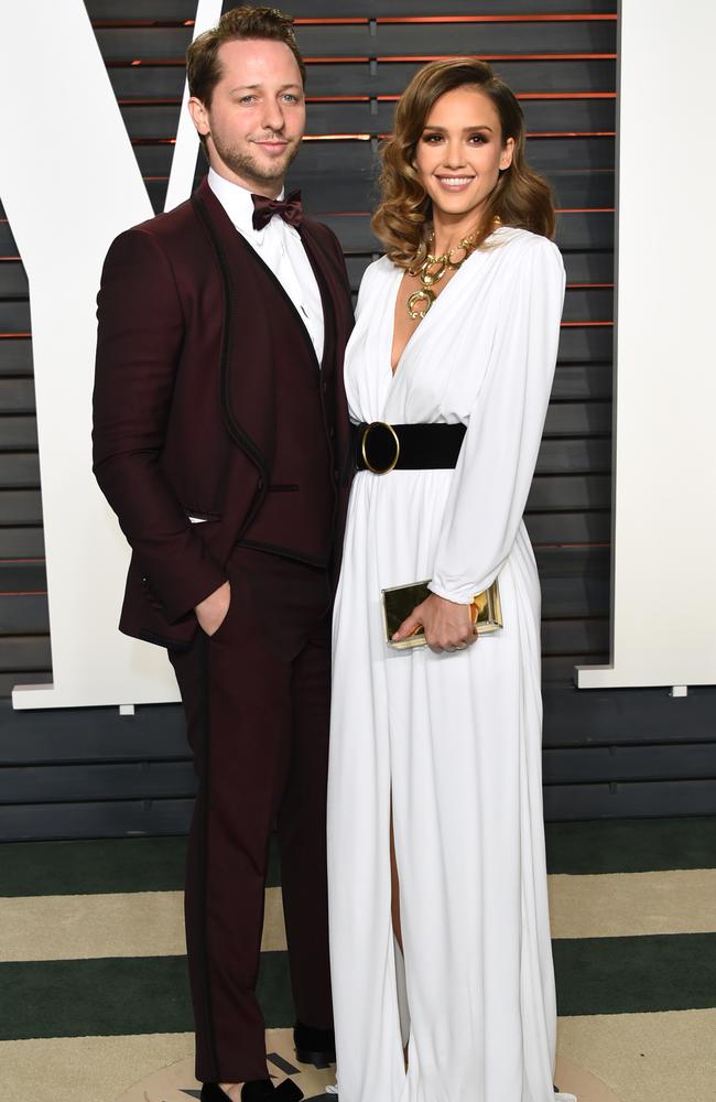Derek Blasberg, left, and Jessica Alba arrive at the Vanity Fair Oscar Party on Sunday, Feb. 28, 2016, in Beverly Hills, Calif. (Photo by Evan Agostini/Invision/AP)