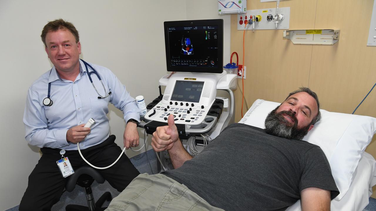 HEART CARE AT HOME: Cardiologist Dr Angus Thompson, left, with Hervey Bay resident Dean Manning at Cardiac Investigation Unit at Hervey Bay Hospital.