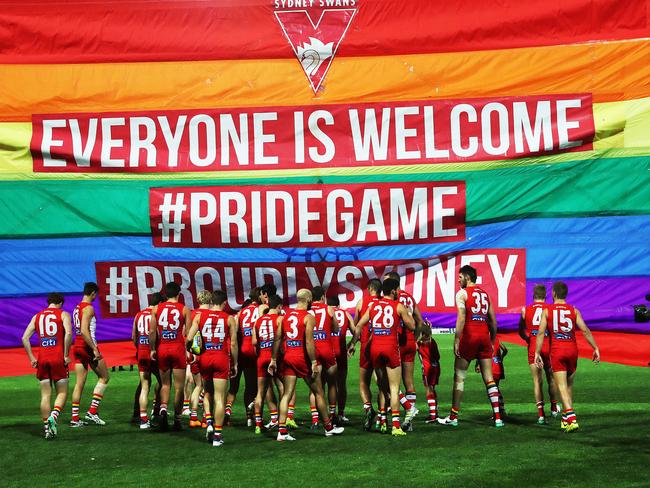 The Swans run out for Pride Game during their AFL match Sydney Swans v St.Kilda at the SCG. Picture. Phil Hillyard