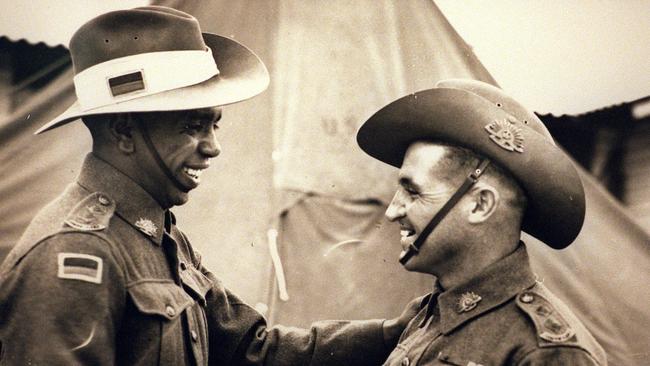 Captain Reg Saunders with Lieutenant Tom Derrick. Picture: Australian War Memorial