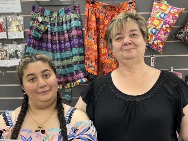 Sophie and Irene Singh, at Sophie's Boutique and Gifts in Darwin, kept the store open throughout the Queen's mourning public holiday. Picture: Annabel Bowles