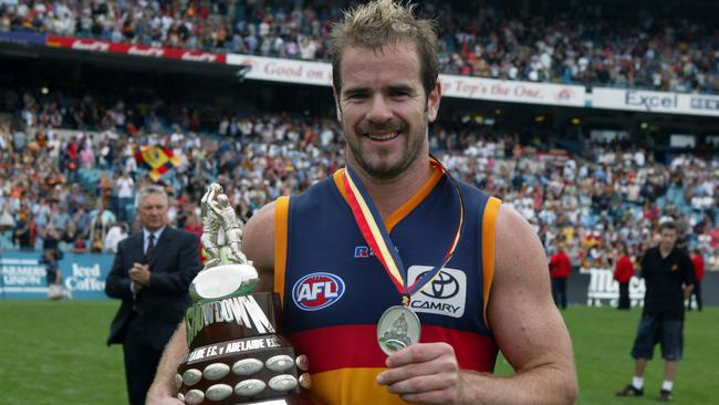 Mark Ricciuto with the Showdown Medal and trophy after the Crows’ win in Showdown 17 in 2005. Picture: Ray Titus