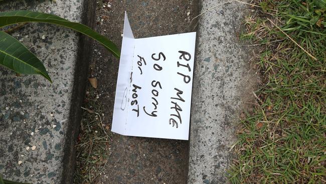 Card and flower at the scene of the crash which killed Michael Warburton. Picture: David Clark