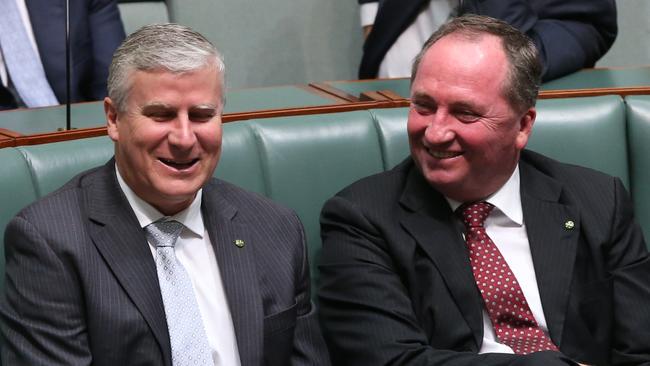 Nationals MP Michael McCormack with Barnaby Joyce in the House of Representatives Chamber at Parliament House in Canberra.