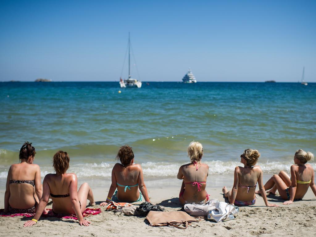 Tourists at Playa d'en Bossa beach. Picture: David Ramos/Getty Images