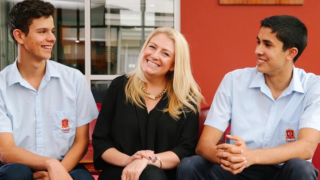 Dannielle Miller presented her Walk the Talk program at Oakhill College. She’s pictued with students Adam Taras (left) and Ryan Symons. Picture: Jonathan Ng