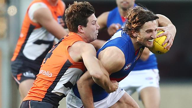 Toby Greene tackles Marcus Bontempelli during GWS Giants’ clash with Western Bulldogs in Round 22 last season.