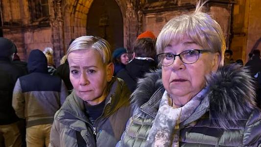 Magdeburg residents Ina Nowak, 45, and her mother Heidi Nowak, 77, attend St John's Church after the Christmas market attack. Picture: Sophie Elsworth