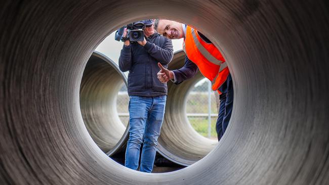 Premier Peter Malinauskas surveys pipes at Virginia being stockpiled for the new works. Picture: Supplied