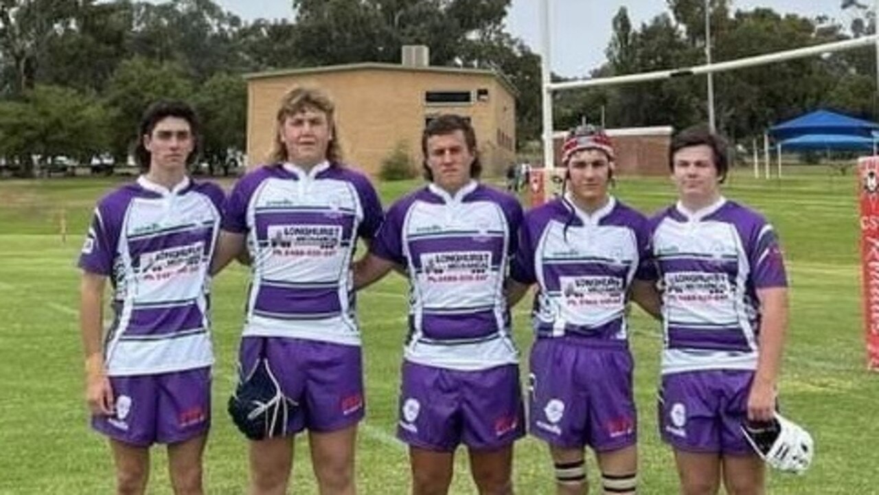 Leeton rugby player Callum Dun, centre, with teammates in his home comp.