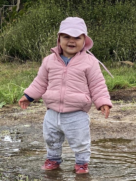 Isabell Moss, of Yass, celebrated her first birthday with a good splash in the puddles.