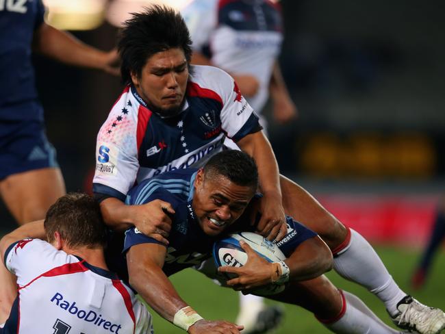 Lolesio’s cousin Francis Saili is tackled playing for the Blues against the Rebels in 2013. Picture: Getty Images