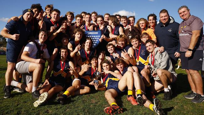 MELBOURNE, AUSTRALIA - AUGUST 03: Whitefriars College celebrate winning the Herald Sun Shield Senior Boys Grand Final between Whitefriars College and St Patrick's Ballarat at Box Hill City Oval on August 03, 2022 in Melbourne, Australia. Picture: Daniel Pockett/AFL Photos/via Getty Images