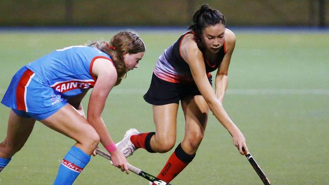 Saints' Talytha Macdonald and Souths' Sophie Gilligan fight for possession. Picture: Brendan Radke