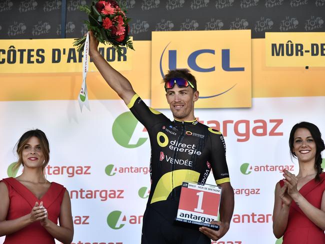 France's Damien Gaudin celebrates with podium girls on July 12. Picture: AFP/Marco Bertorello