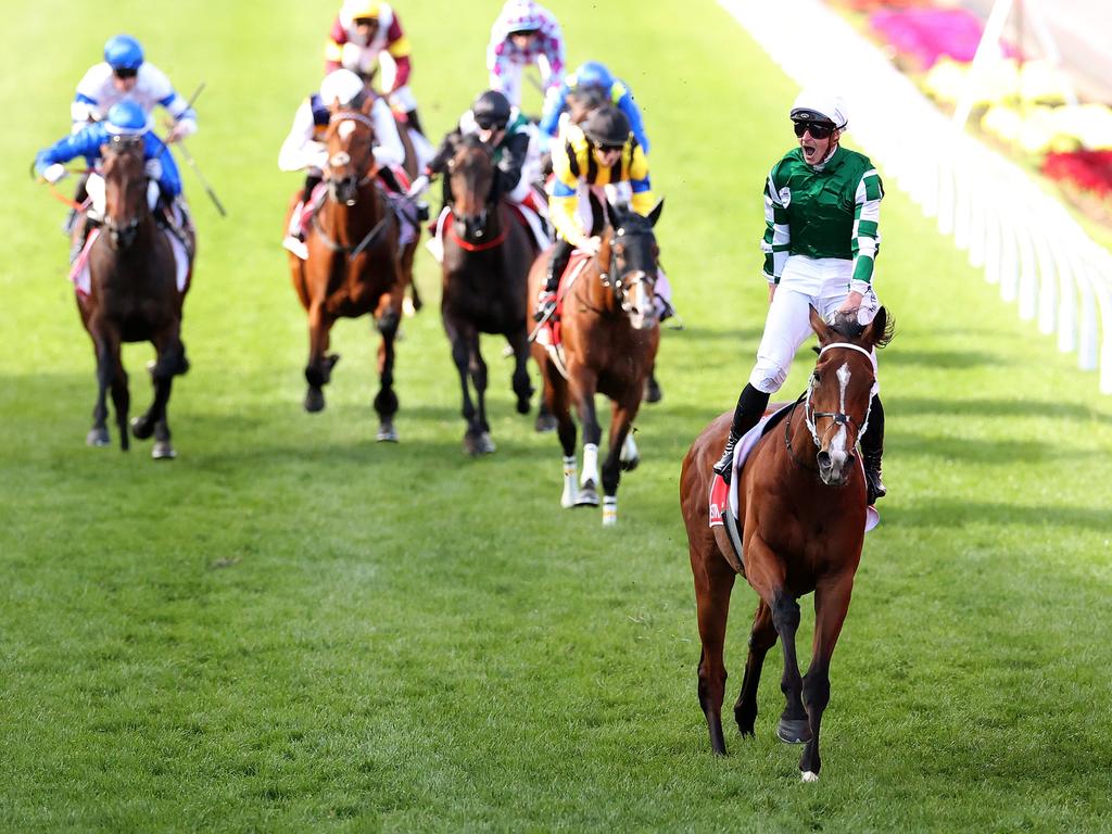 Without peer … James McDonald celebrates Via Sistina’s amazing Cox Plate victory. Picture: Kelly Defina / Getty Images