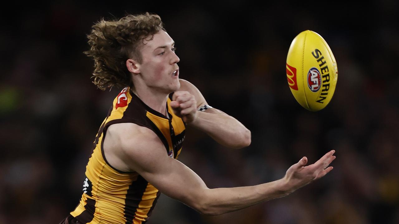 Josh Weddle fires off a handball. Picture: Darrian Traynor/Getty Images