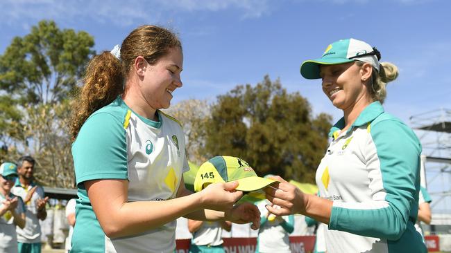 Darlington is presented with her Australia cap by Ashleigh Gardner last year.