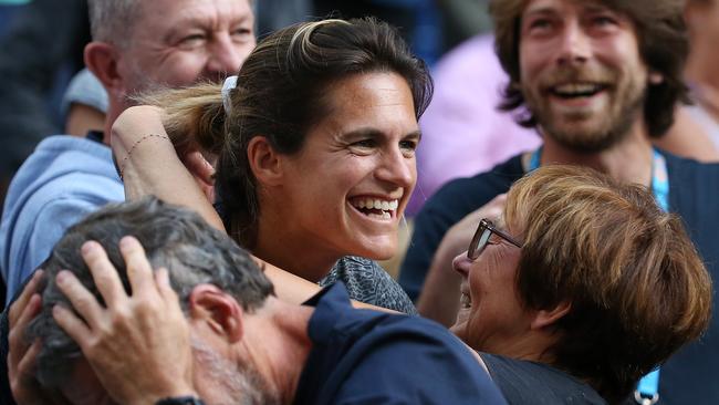 Amelie Mauresmo gets hugs and kisses after todays match . Pic: Michael Klein