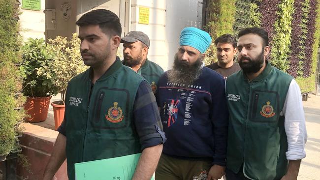 The arrest of Rajwinder Singh in India. Picture: Tawqeer Hussain