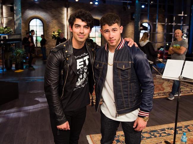 Joe Jonas with his brother Nick on the set of The Voice Australia.