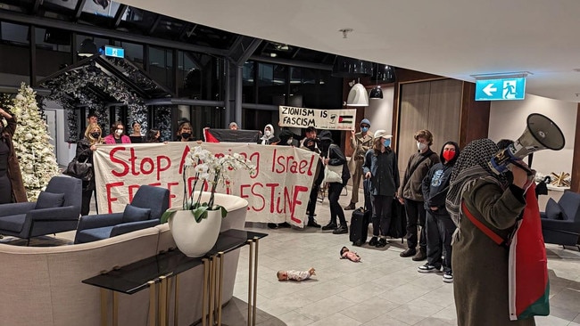 Pro-Palestine activists sparked outrage after they ambushed visiting friends and families of Israeli hostages at the Melbourne hotel where they were staying.