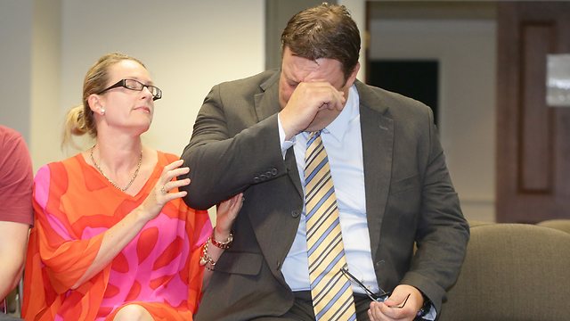 New Senater Glenn Lazarus from Palmer United Party breaks down during his speech.