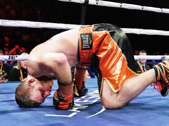 Australian boxers Jeff Horn hits the deck against Michael Zerafa compete during the 'Battle of Bendigo' bout at the Bendigo Stadium in Bendigo, Saturday, August 31, 2019. (AAP Image/Michael Dodge) NO ARCHIVING, EDITORIAL USE ONLY