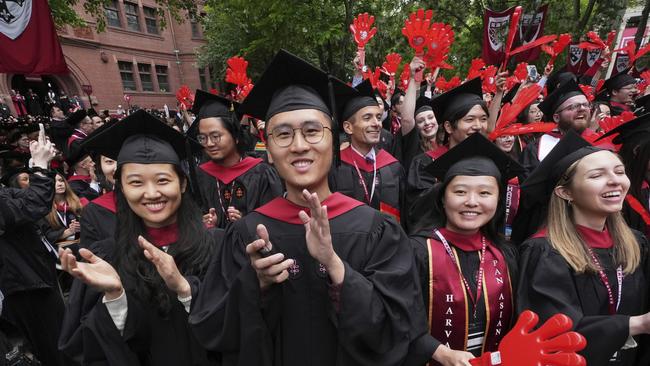 Graduates applaud during commencement ceremonies at Harvard University, Thursday, May 29. Picture: AP Photo/Charles Krupa