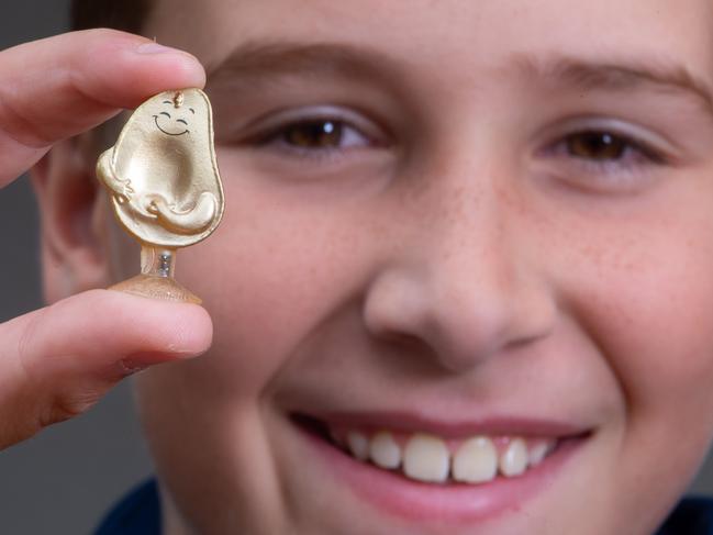 Eleven-year-old Mason Peatling from Point Cook had collected 23 of the 24 regular Stikeez with his family when he unwrapped the Golden Avocado. Picture: Jay Town