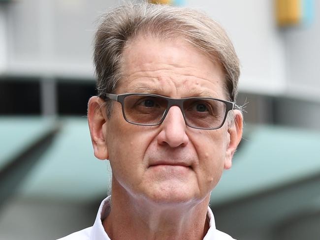 Keith Benjamin Greenland leaves the Magistrates Court in Brisbane, Tuesday, February 25, 2020. Greenland is charged with possessing child exploitation material and using a carriage service to access child abuse material. (AAP Image/Dan Peled) NO ARCHIVING