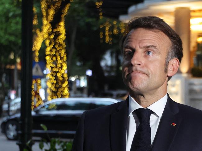 France's President Emmanuel Macron gives a press statement near the Metropole Hotel before attending a state dinner in Hanoi on May 26, 2025. Picture: AFP