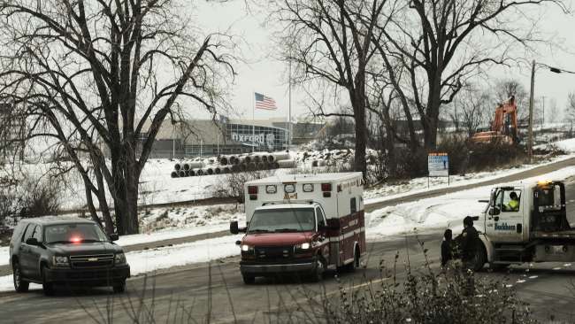 An ambulance seen leaving the scene of the shooting which occurred roughly 50 kilometres north of Detroit. Picture: Matthew Hatcher/Getty Images