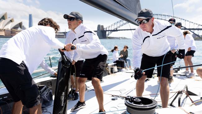 The crew of the Ichi Ban at work on Sydney Harbour on Sunday. Picture: Ryan Osland